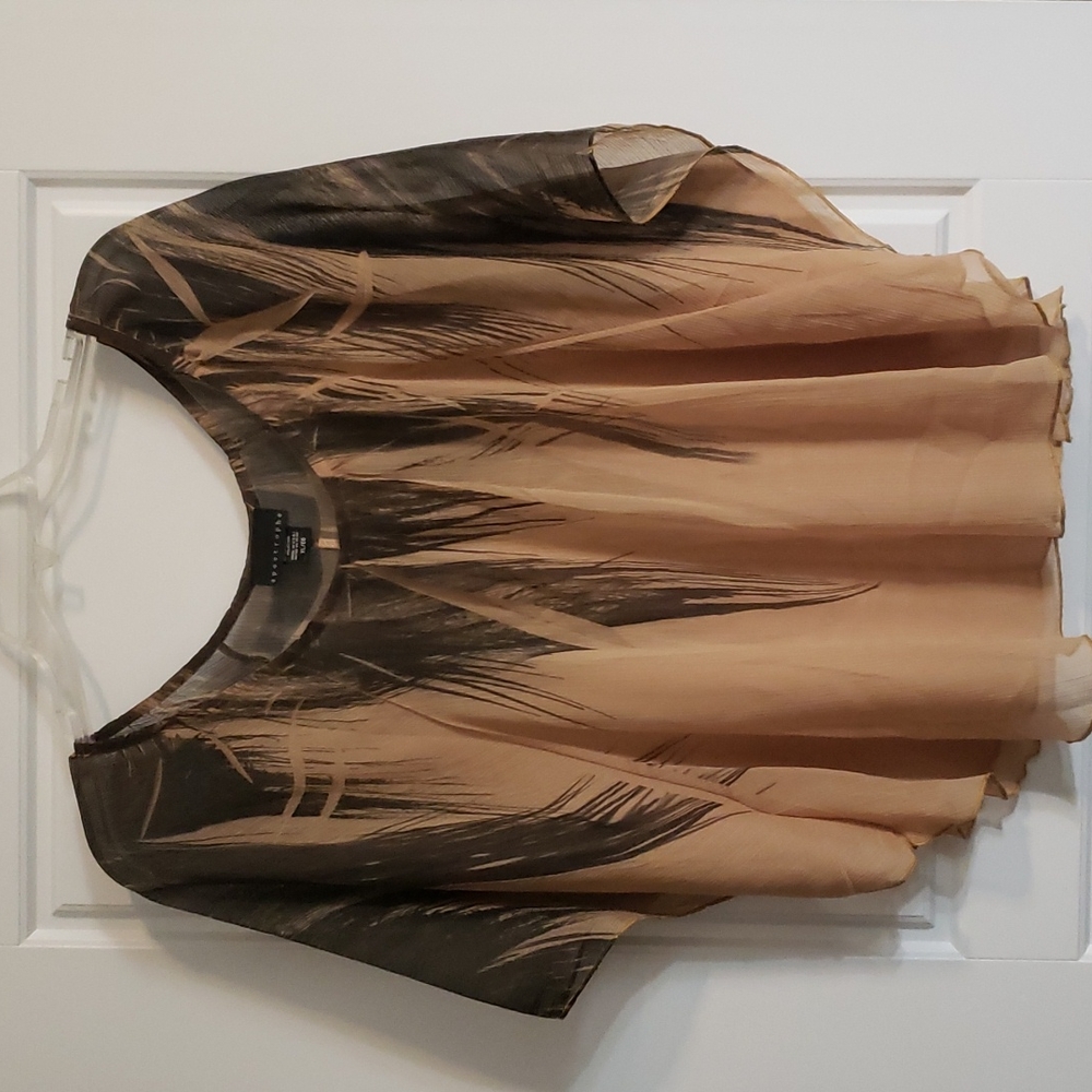 Beige and Black blouse sheer material.
